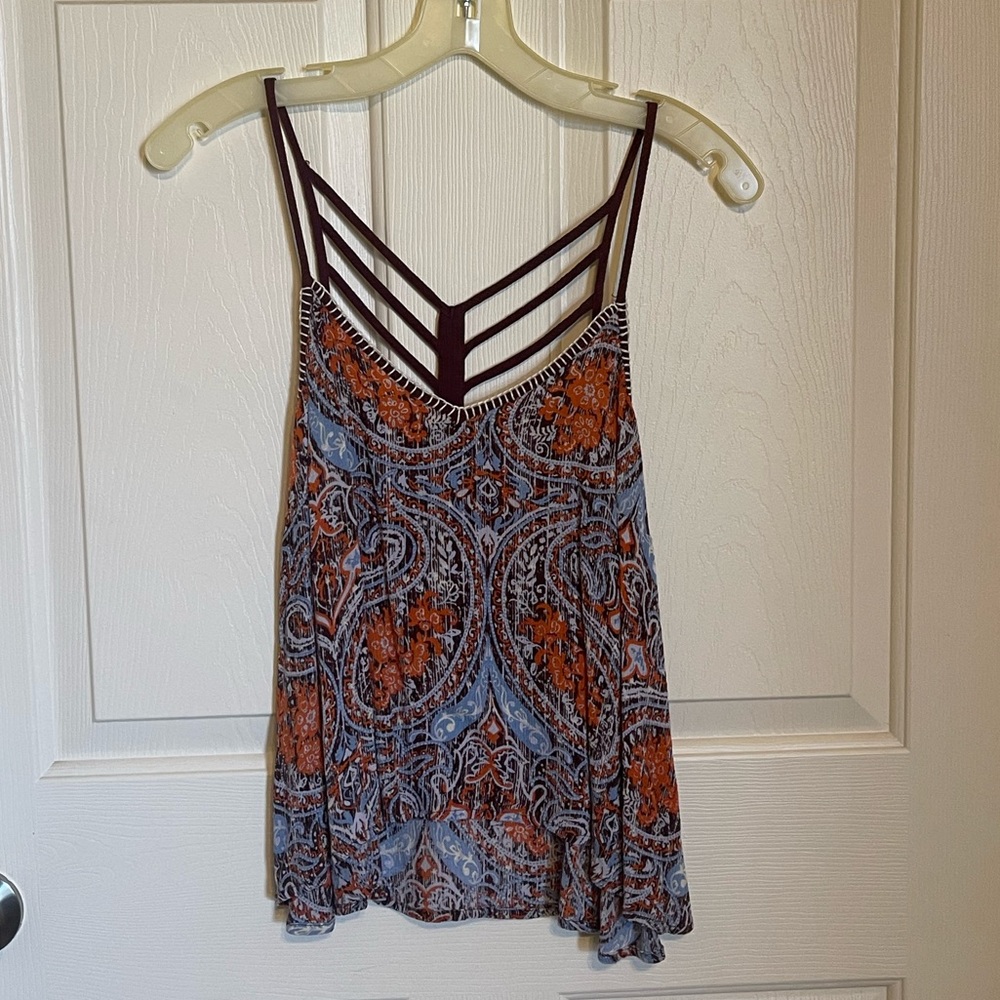 Orange, purple, blue, white top